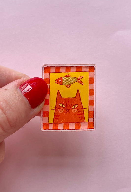 Cat and fish pin badge